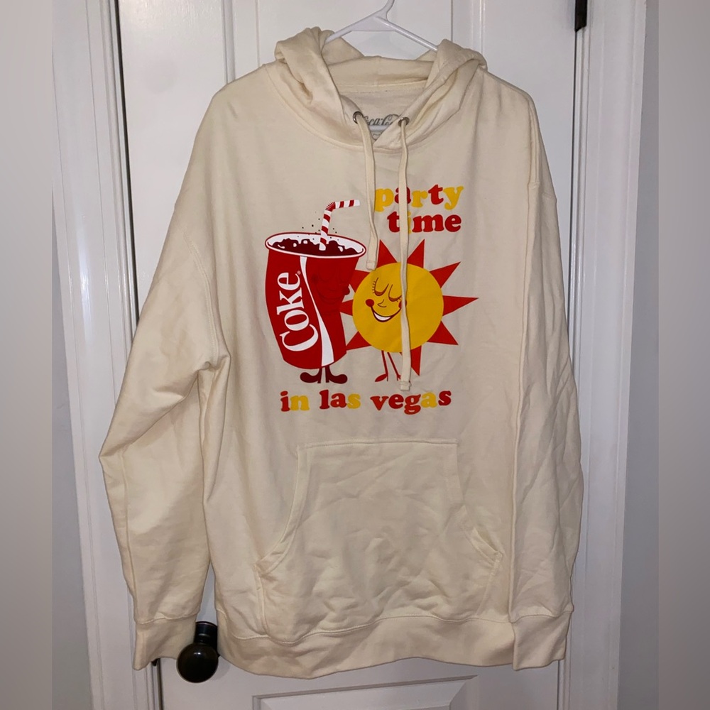 Coca Cola Cream Hoodie with Sun and Drink Design